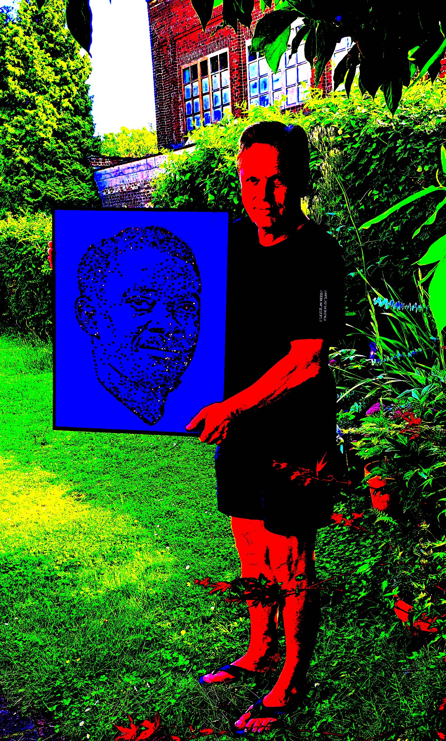 Al Georg with his original artwork on Patrice Lumumba