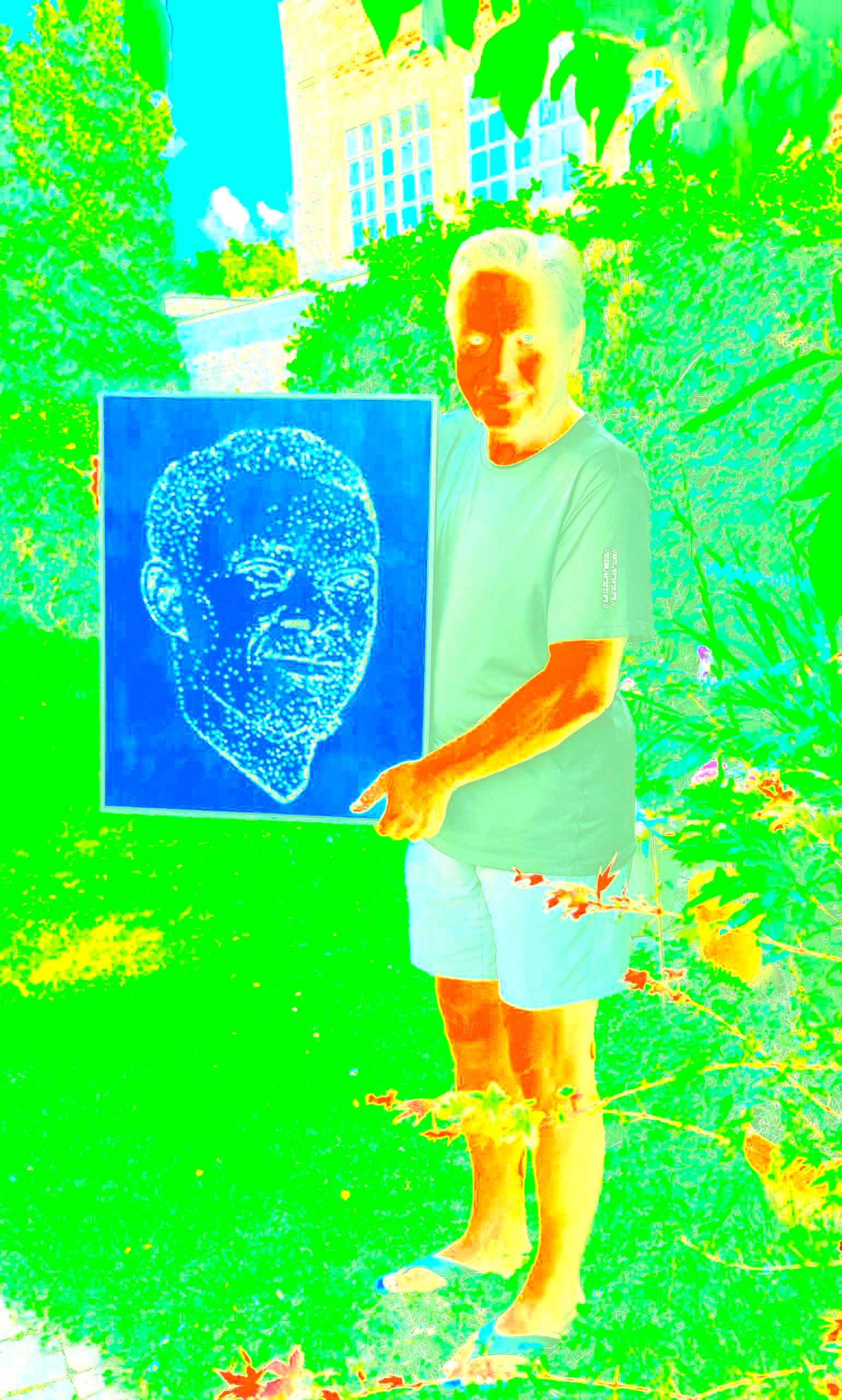 Al Georg with his original artwork on Patrice Lumumba